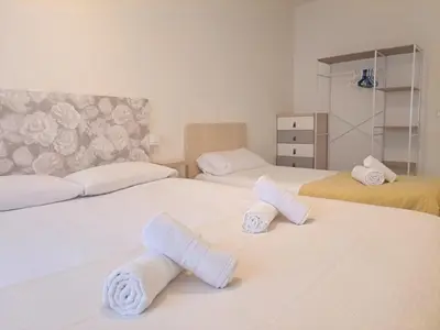 Cama o camas de una habitación en 2a Línea de Mar, Playa de Lloret, Centro Histórico