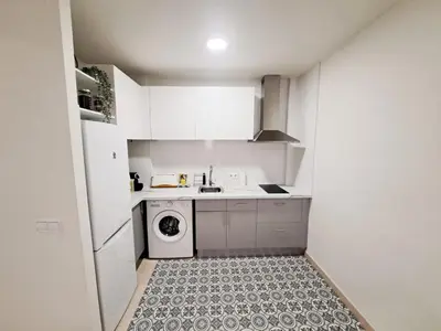 Una cocina o zona de cocina en 2a Línea de Mar, Playa de Lloret, Centro Histórico