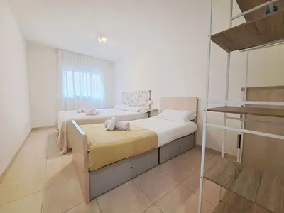 Cama o camas de una habitación en 2a Línea de Mar, Playa de Lloret, Centro Histórico