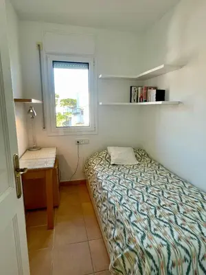 Cama o camas de una habitación en Confort al cor de Calella