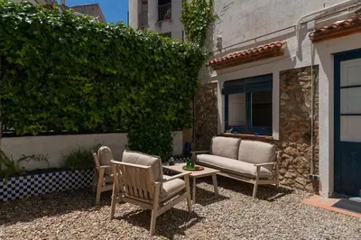 Un patio o zona al aire libre en Seahomes Vacations - Tossa VillageHouse 150m Beach and PKG