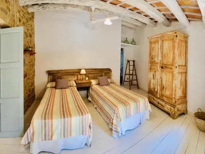 Cama o camas de una habitación en Can Bufas CostaBravaSi
