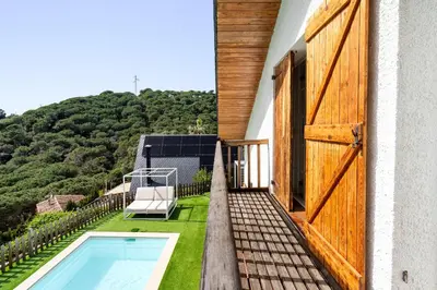 Piscina en o cerca de Hauzify I Casa Montjuïc