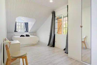Cama o camas de una habitación en Hauzify I Casa Montjuïc