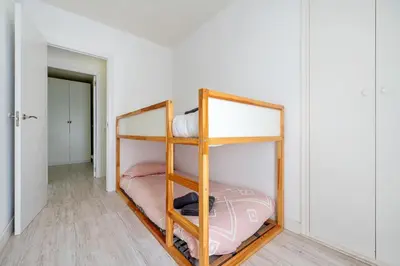 Cama o camas de una habitación en Hauzify I Casa Montjuïc