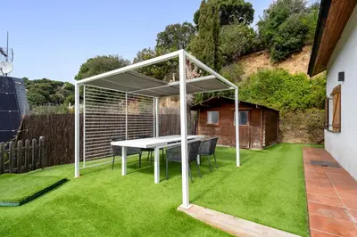 Jardín al aire libre en Hauzify I Casa Montjuïc