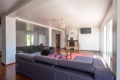 Una televisión o centro de entretenimiento en Villa Auba Lloret
