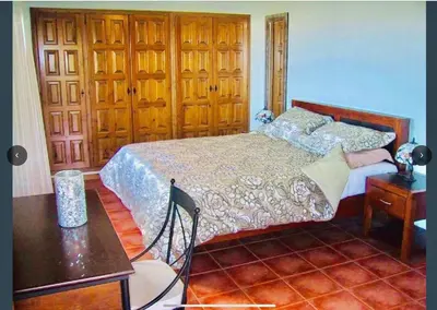 Cama o camas de una habitación en Villa Tranquila Large luxury 3 bedroomed 2 bathrooms private Villa with pool and Sea Views in Calonge Sant Antoni de Calonge