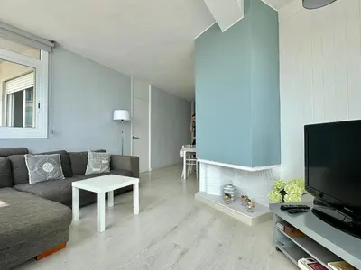 Una televisión o centro de entretenimiento en Apartamento Sicamar en Platja d'Aro