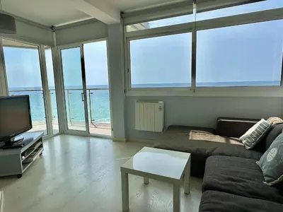 Una televisión o centro de entretenimiento en Apartamento Sicamar en Platja d'Aro