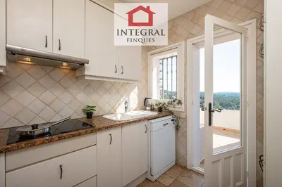 Una cocina o zona de cocina en Casa les Lutins