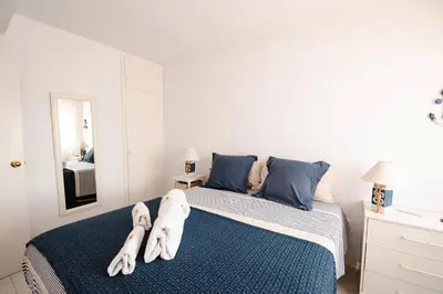 Cama o camas de una habitación en Apto con vista fantástica y piscina en S'Agaró