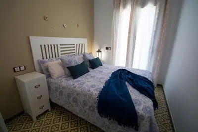Cama o camas de una habitación en Casa grande con piscina en el centro de Calella, Tramuntana