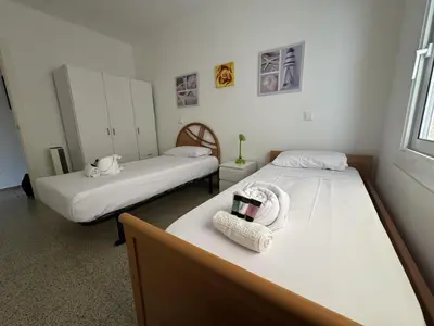 Cama o camas de una habitación en Apartamento Pineda de Mar en Primera Línea