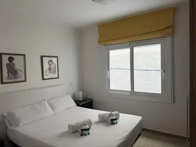 Cama o camas de una habitación en Apartamento Pineda de Mar en Primera Línea