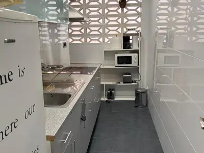 Una cocina o zona de cocina en Apartamento Pineda de Mar en Primera Línea