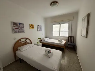 Cama o camas de una habitación en Apartamento Pineda de Mar en Primera Línea