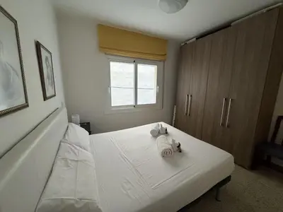 Cama o camas de una habitación en Apartamento Pineda de Mar en Primera Línea