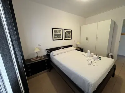 Cama o camas de una habitación en Apartamento Pineda de Mar con Vistas al Mar