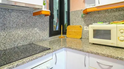 Una cocina o zona de cocina en Vivalidays Margarita - Pineda de Mar