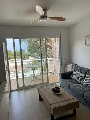 Zona de estar de Apartament en la Fosca Palamos mar y piscina