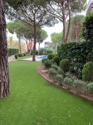 Jardín al aire libre en Apartament en la Fosca Palamos mar y piscina
