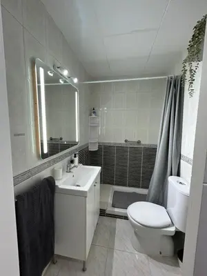 Un baño de Apartamento con Terraza,Piscina,Playa y Aire acondicionado