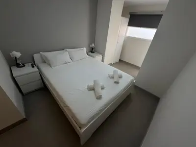 Cama o camas de una habitación en Apartamentos en la rambla