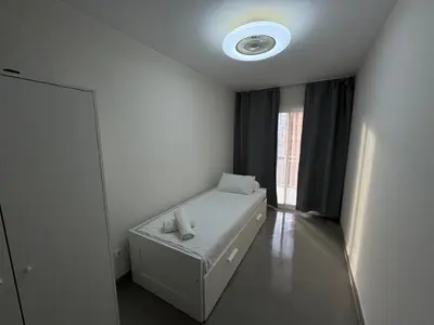 Cama o camas de una habitación en Apartamentos en la rambla