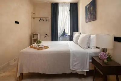 Cama o camas de una habitación en Hotel Vella Nit