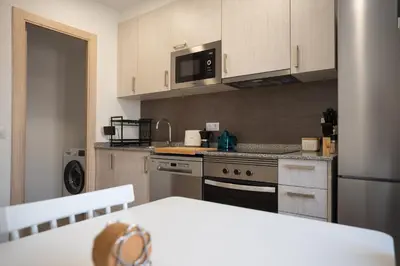 Una cocina o zona de cocina en LETS HOLIDAYS Centric & Near the Sea Victoria apartment 3