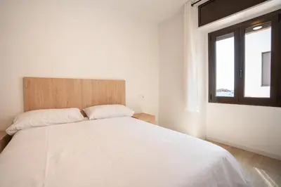 Cama o camas de una habitación en LETS HOLIDAYS Centric & Near the Sea Victoria apartment 3