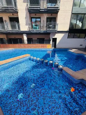 Piscina en o cerca de Piso de SIMBA cerca de playa, con piscina y varias terrazas