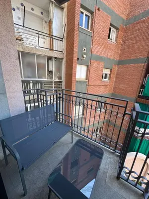 Un balcón o terraza de Piso de SIMBA cerca de playa, con piscina y varias terrazas