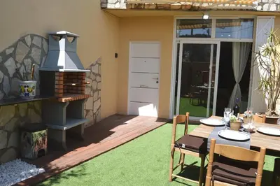 Un patio o zona al aire libre en Anglada, Villa with a private pool and jacuzzi