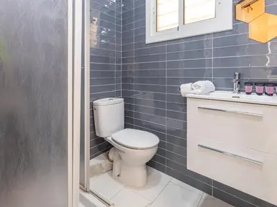 Un baño de Winahost Apartamento Blanes