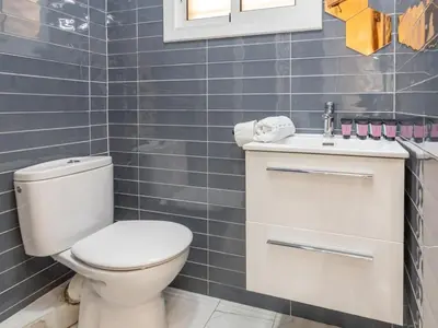 Un baño de Winahost Apartamento Blanes