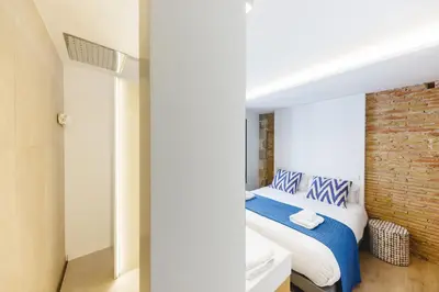 Cama o camas de una habitación en Bravissimo Ballesteries Onyar View, Monthly Apartment