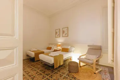 Cama o camas de una habitación en Bravissimo Ciutadans A, 4-bedroom apartment Barri Vell