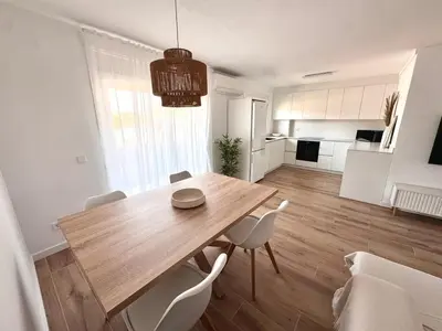 Una cocina o zona de cocina en Apartamento Platja d 'Aro 70 m2