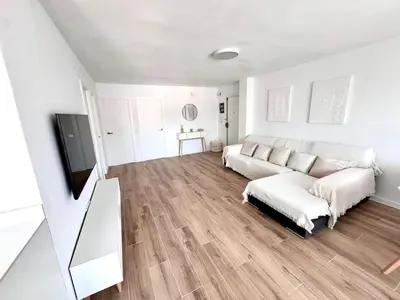 Una televisión o centro de entretenimiento en Apartamento Platja d 'Aro 70 m2