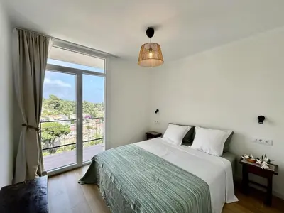 Cama o camas de una habitación en Cala Morisca full AC Sea View Home