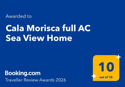 Certificado, premio, señal o documento que está expuesto en Cala Morisca full AC Sea View Home