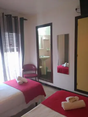 Cama o camas de una habitación en Hotel Miami