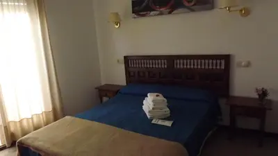 Cama o camas de una habitación en Hotel Miami