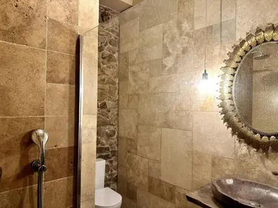 Un baño de Stone Rustic Beach apartment