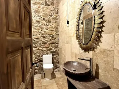 Un baño de Stone Rustic Beach apartment