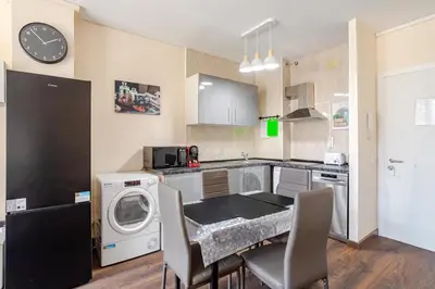 Una cocina o zona de cocina en Apartamento con Piscina cerca de Playa de Fenals