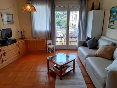 Una televisión o centro de entretenimiento en Canet playa