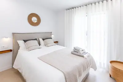 Cama o camas de una habitación en Apartments Cap de Planes Calella de Palafrugell - by EMERALD STAY